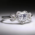Silver Tone Heart Clear Stone Halo Twist Band Ring view 1