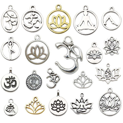 Metallic assorted shape charms arranged on a light background