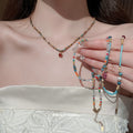 Turquoise Seed Bead And Earth Tone Crystal Drop Necklaces view 2