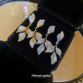 Crystal Leaf Branch Drop Earrings in Gold and Silver Tones view 1