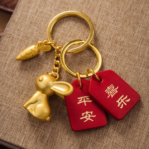 Gold Rabbit and Carrot Keychains in Fourteen Pictured Styles