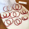 Red Hoop Earrings in Eight Size and Finish Variations view 1