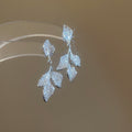 Crystal Leaf Branch Drop Earrings in Gold and Silver Tones view 7