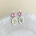 Pearl Pink Bow Tulip Charm Drop Earrings Cream Oval Plaque view 4