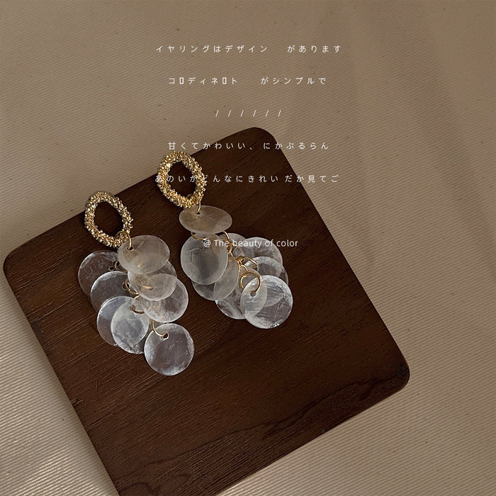 Gold Tone Textured Oval And Translucent White Disc Tassel Earrings