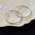 Textured Metal Hoop Earrings in Gold and Silver Two Sizes view 6