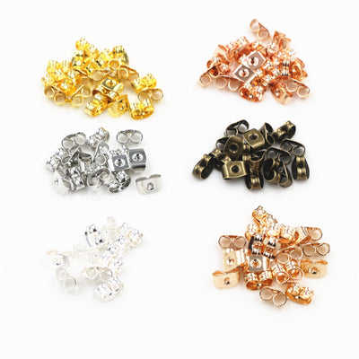 Square metal earring backs showing the overall assortment