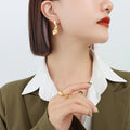 Irregular Wavy Sculptural Metal Stud Earrings Gold Steel view 1