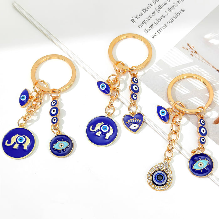 Navy Enamel Evil Eye Elephant Charm Keychain With Heart Accent