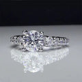 Silver Tone Round Solitaire Ring With Stone Set Shoulders view 2