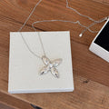 Silver Tone Four Point Starburst Pendant Long Necklace view 2
