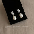 Silver Tone Clear Stone Top And Irregular White Pearl Stud Earrings view 3