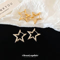 Open Star Metal Clip On Earrings in Gold and Silver Tones view 3