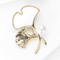 Gold Tone Ginkgo Leaf Brooch with White Inlay and Pearl Accent view 3
