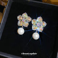 Iridescent Crystal Flower Stud Earrings with Round White Pearl Drops view 1