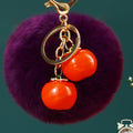 Twin Persimmon Plush Pom Keychains in Fifteen Listed Loop Colors view 8