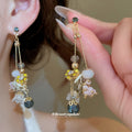 Colorful Floral Beaded Long Dangle Stud Earrings with Polished Metal Details view 1
