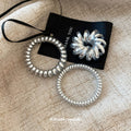 Silver Metallic Spiral Coil Hair Tie In The Listed Medium Style view 1
