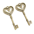 Long Heart Bow Key Charm in an Antique Bronze Finish view 5
