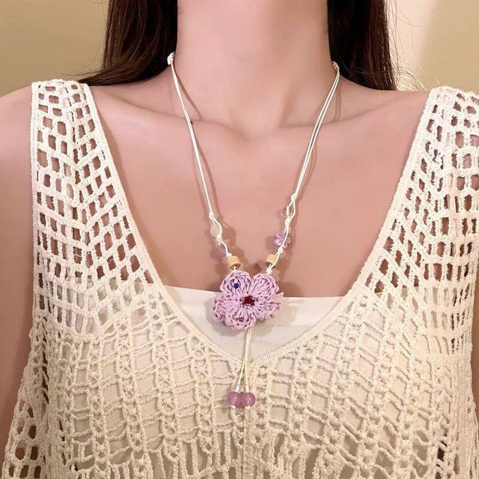 Woven Flower Bead Pendant Necklace with Polished Metal Tone Details