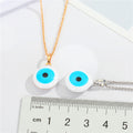 Round Blue Evil Eye Pendant Necklaces in Gold or Silver Tone view 2