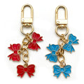 Three Bow Charm Keychain in Red or Blue with Gold Tone Clasp view 5