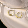 Gold Twisted Geometric Oval Crystal Inlay Hoop Earrings view 6