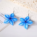 Silver Tone Plumeria Acrylic Hook Earrings in Three Colors view 2