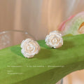 White Pearlized Rose Flower Stud Earrings Carved Bloom Design view 4