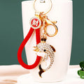 Crown Dolphin Keychains in Three Colors with Fortune Braided and Plain Loops view 3