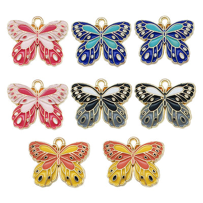 Colorful butterfly charms arranged on a light background