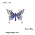 Enamel Butterfly Brooch With Polished Metal And Sculpted Decorative Details view 6