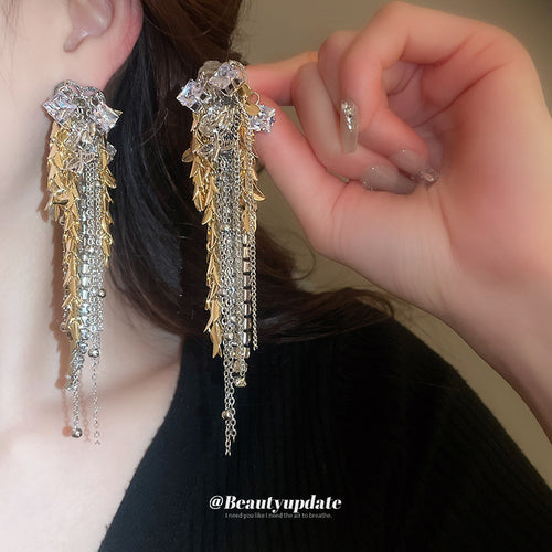 mixed metal wheat and crystal fringe stud earrings displayed from a second angle
