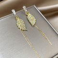 Twenty-Seven Mixed Gold Tone Stud Hoop and Dangle Earrings view 11