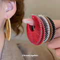 Woven Open Circle Huggie Earrings In Eight Designs view 2