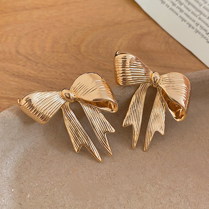 Gold-Tone Textured Bow Stud Earrings - One Style Polished Decorative Design