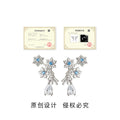 Silver Tone Aqua Snowflake Branch And Clear Teardrop Stud Earrings view 3