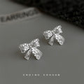 Silver Tone Crystal Pave Bow Stud Earrings Engraved Texture view 6