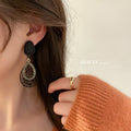 Black Filigree Floral and Checkered Statement Earrings view 4