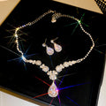 Silver Tone Round Crystal Cluster Necklace And Iridescent Teardrop Earrings view 6