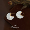 White Pearlescent Disc Stud Earrings With Gold Tone Square Cutout view 3