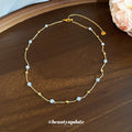 Delicate Gold Tone Necklace with Small Pastel Beads view 2