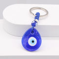 Silver Tone Blue Glass Evil Eye Clip Keychains in Five Shapes view 6