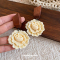 Carved Cream Flower Drop Earrings with Dark Wood Stud Tops view 4