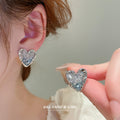 Silver Tone Heart Stud Earrings with Faceted Centers view 1