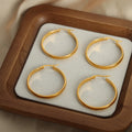 Large Polished Oval O-Hoop Earrings Gold Tone Metal view 4