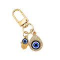Gold Evil Eye Hamsa Hand Keychain With Blue Eye Charm view 5