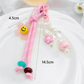 Smiley Daisy Flower Keychain with Pearl Beaded Cord view 4