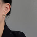 Gold Tone Ivory Enamel Interlocking Leaf Cluster Stud Earrings view 2