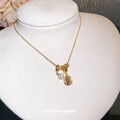 Gold Tone Oval Pearl Charm Necklaces With Decorative Accents view 3